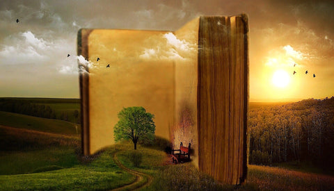 An illustration of a large book and a tree