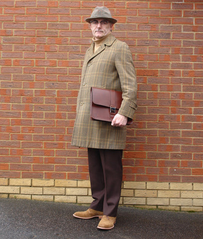 Eric Musgrave with a Holdall & Co 14" London Tan Folio