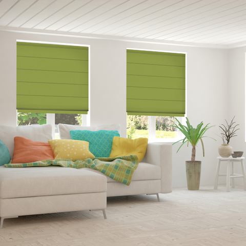Green roman blind in a living room