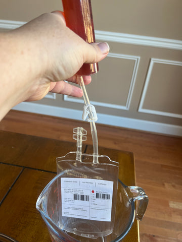 Filling blood bag with cocktail using syringe