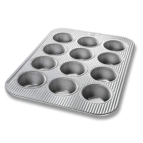 https://cdn.shopify.com/s/files/1/0474/2338/9856/products/usa-pan-usa-pan-12-cup-muffin-pan-10863-29643321573536_1600x.jpg?v=1628112940