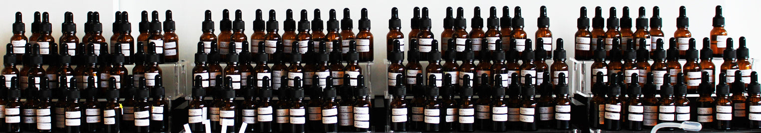 Dropper bottles lined up from Mikathealchemist's personal studio