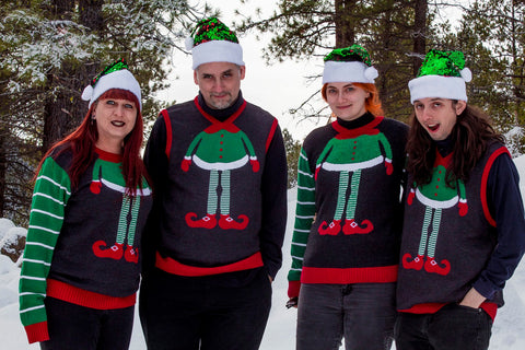 Family in matching Ugly Christmas Sweaters