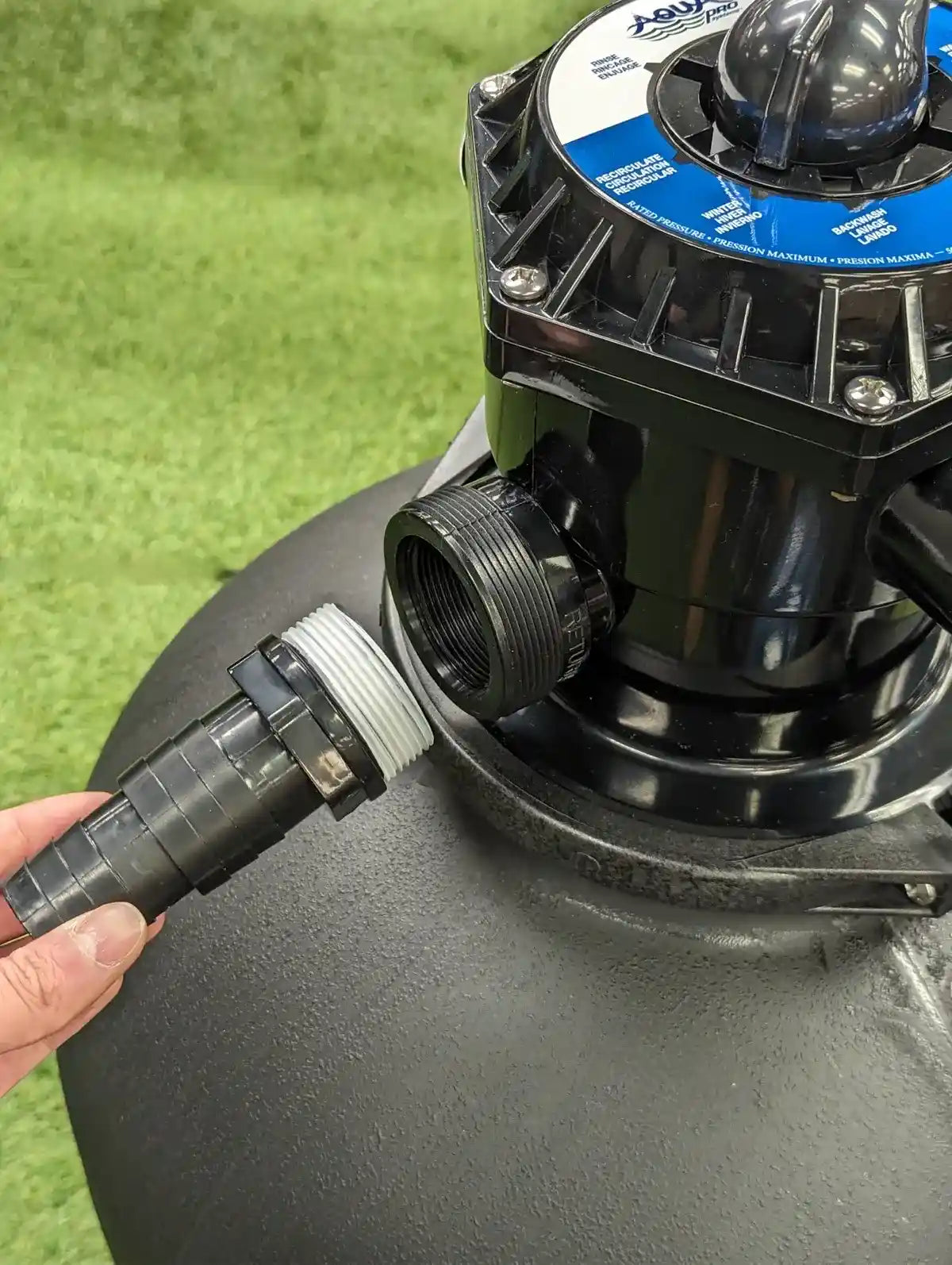 Connecting hoses on aquapro sand filter step 18