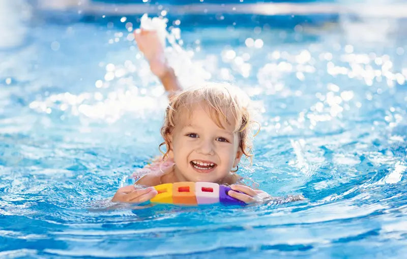 kid-in-semi-inground-pool-swimming.webp__PID:25306ffa-641e-492b-8100-786f38c760a3