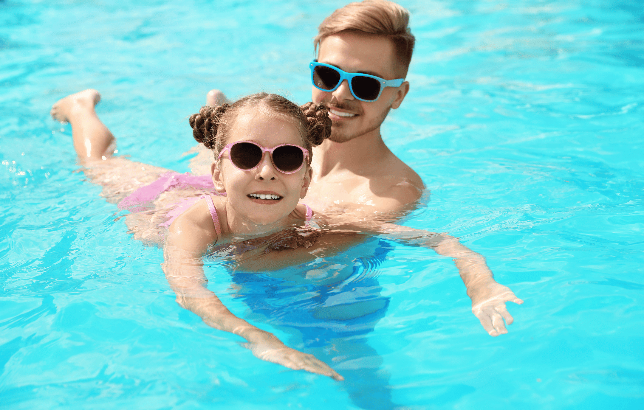 kids-in-above-ground-pool-with-float-opening.png__PID:bc0a1c53-bcfe-4a0c-95f2-9d431339170a