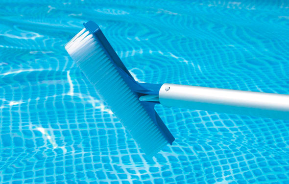 use a pool brush to brush any piles of salt
