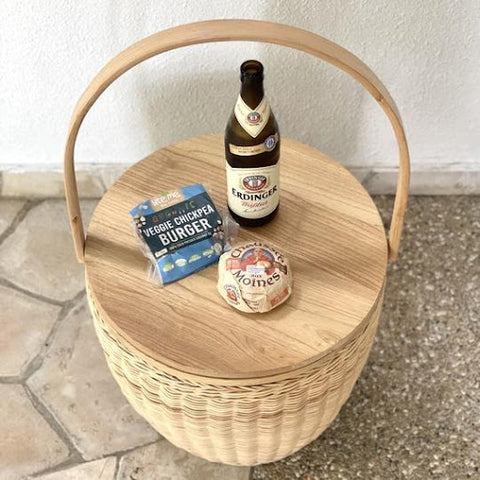 Picnic basket made of rattan with a teak lid