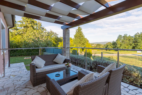 Rattan furniture placed on a deck