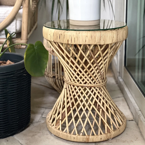 The String Side Table with a white vase on top