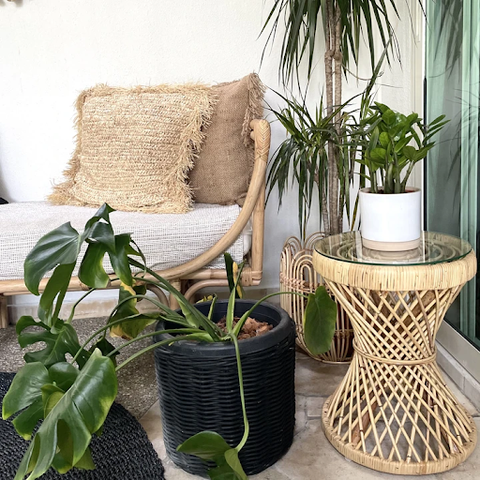 Stylish bowed shape side table made from rattan