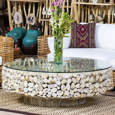 Centerpiece coffee table made from whitewashed driftwood and glass top