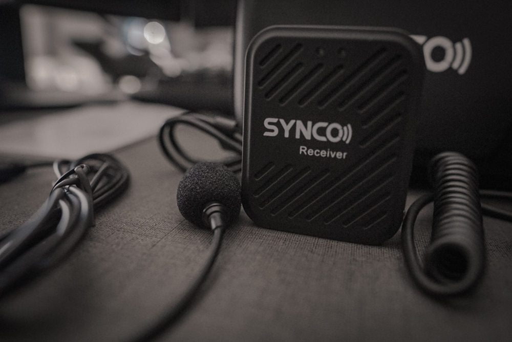 SYNCO G1(A1) clip on wireless microphone for computer is used with an external lav mic.