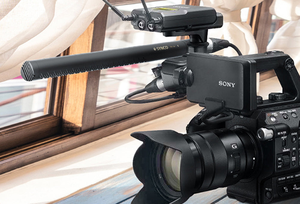 SYNCO D2 XLR shotgun mic for DSLR is mounted on the DSLR camera.