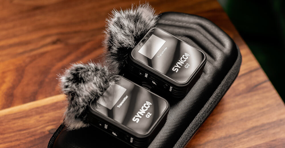 SYNCO G2(A2) wireless lavalier microphone system has furry windshields in the package.