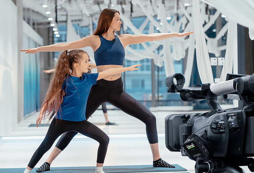 SYNCO G2(A2) dual wireless microphone for camcorder is used to record two-person fitness video.