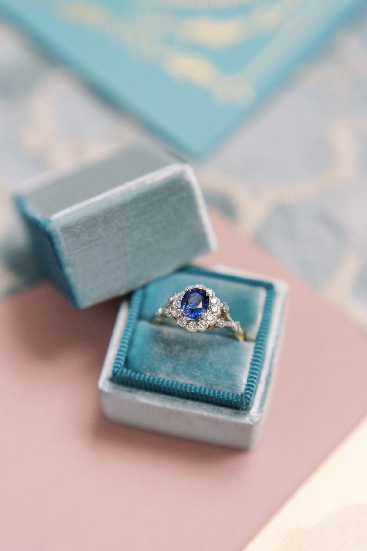 Edwardian flower ring with blue sapphire and diamonds