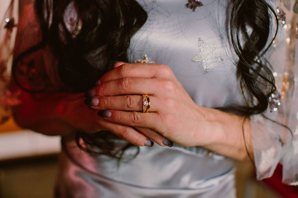 Engraved yellow gold and diamond engagement ring with plain wedding band