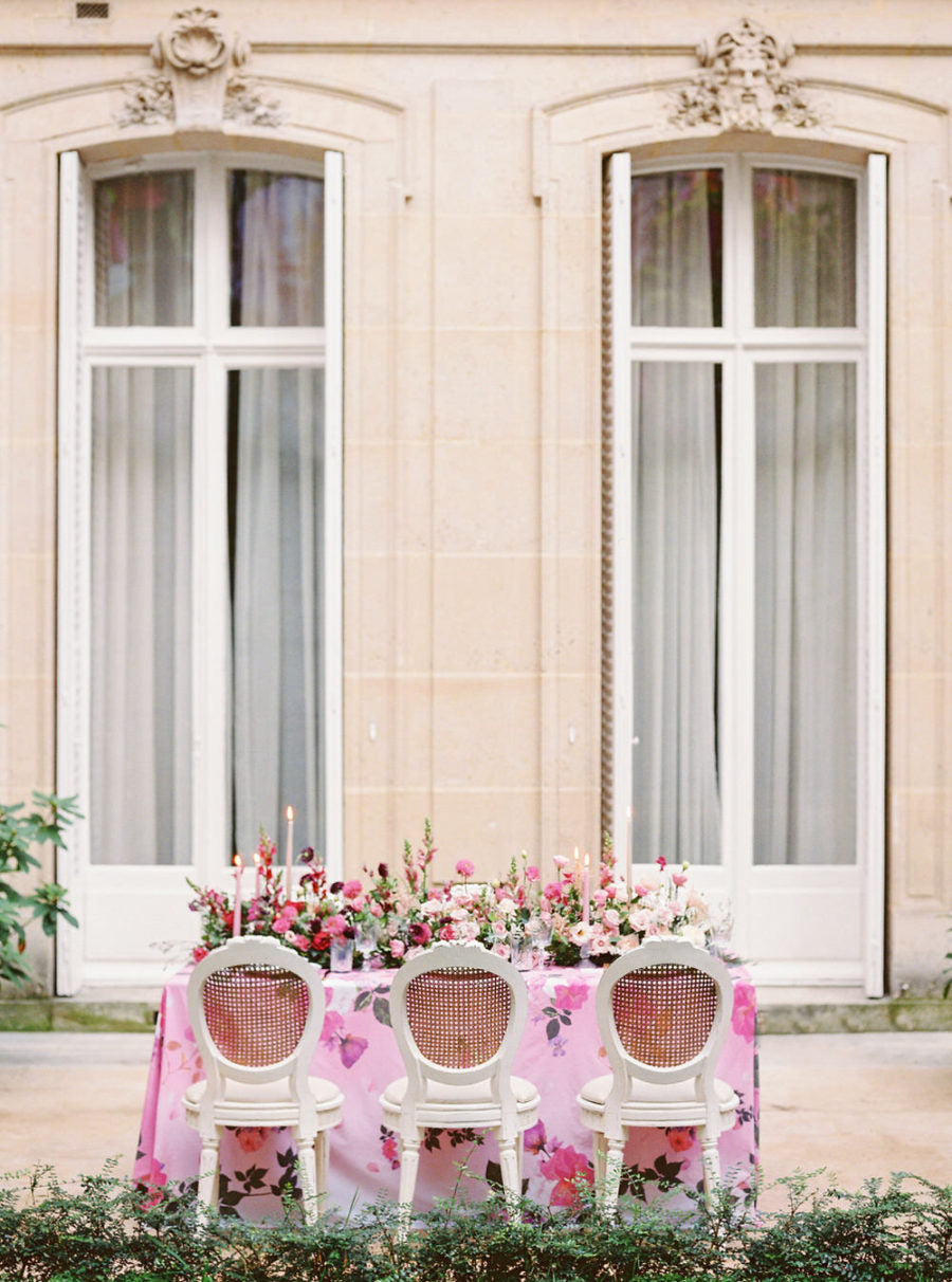 Pink and white table set up for wedding celebration