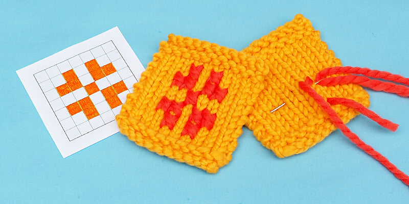 Cross stitch on knitting
