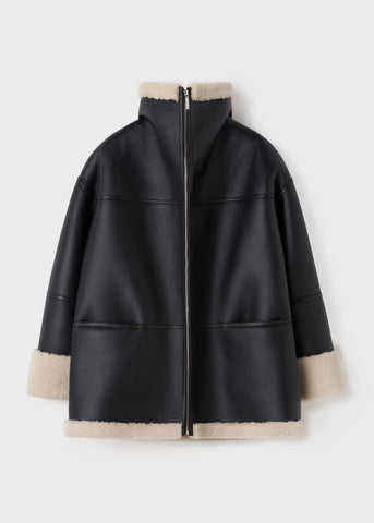 Signature shearling jacket black/off-white – Totême
