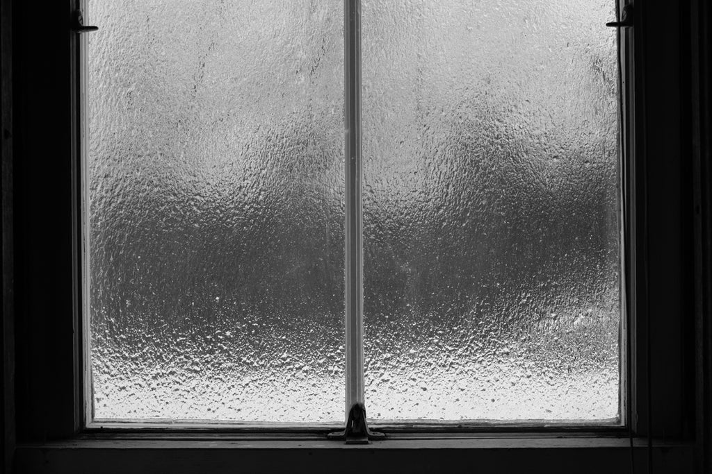 cold frost freezing rain on windows