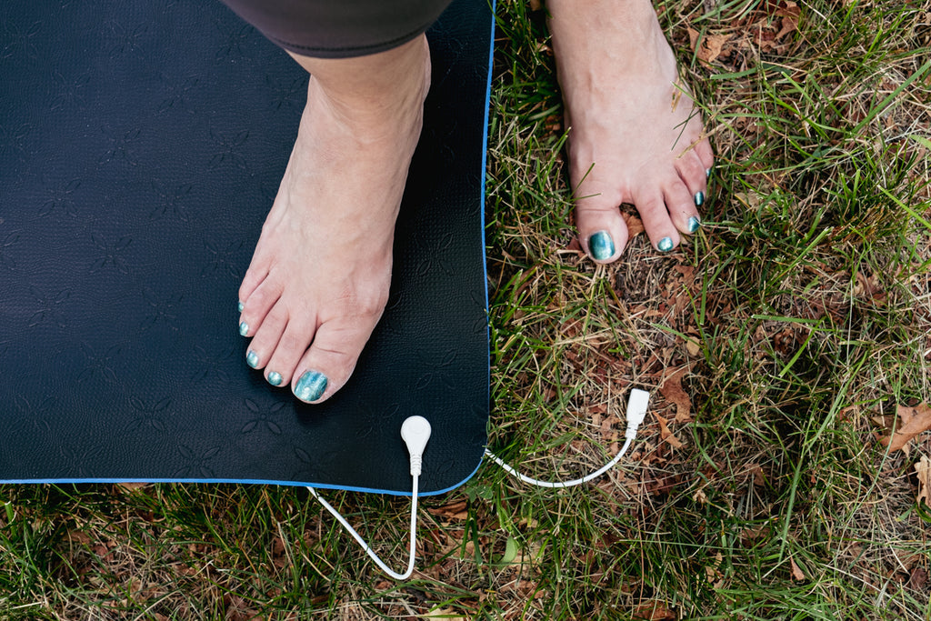 earthing outdoors with exercise mat