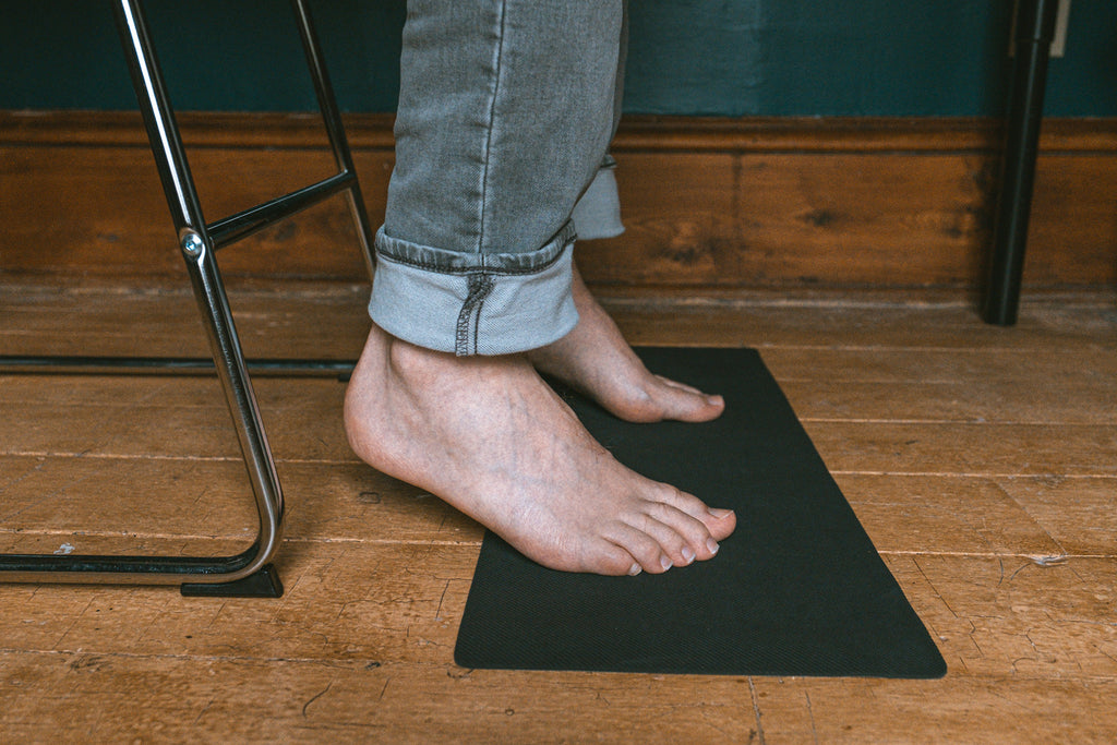 Do your work while you are earthing with a grounding desk pad