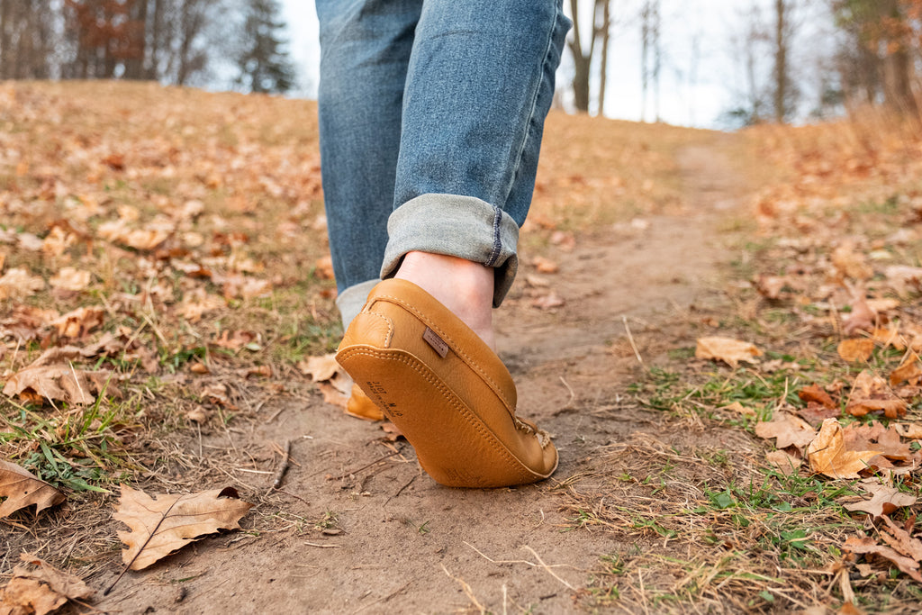 Pure genuine leather is conductive and allow electrons for flow from the earthing into the soles of your feet