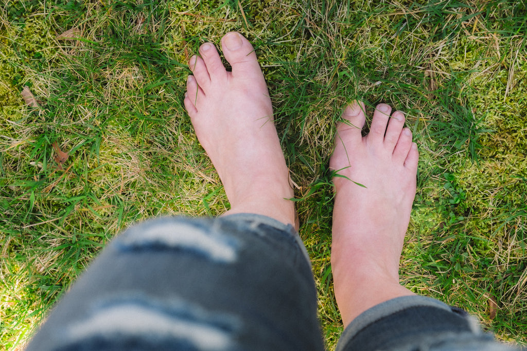 The exercise of Earthing walking barefoot on the ground to allow electrons to flow into your body