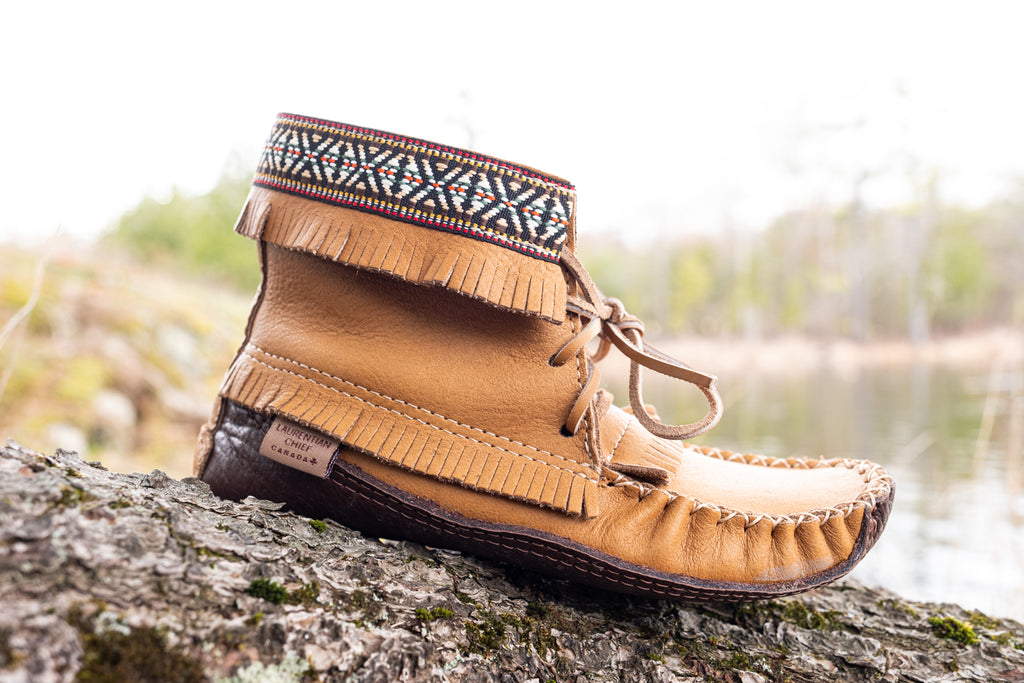 Trimmed with Indigenous-inspired braiding and three rows of fringe these Earthing Moccasin Boots for Women are as beautiful as they are conductive
