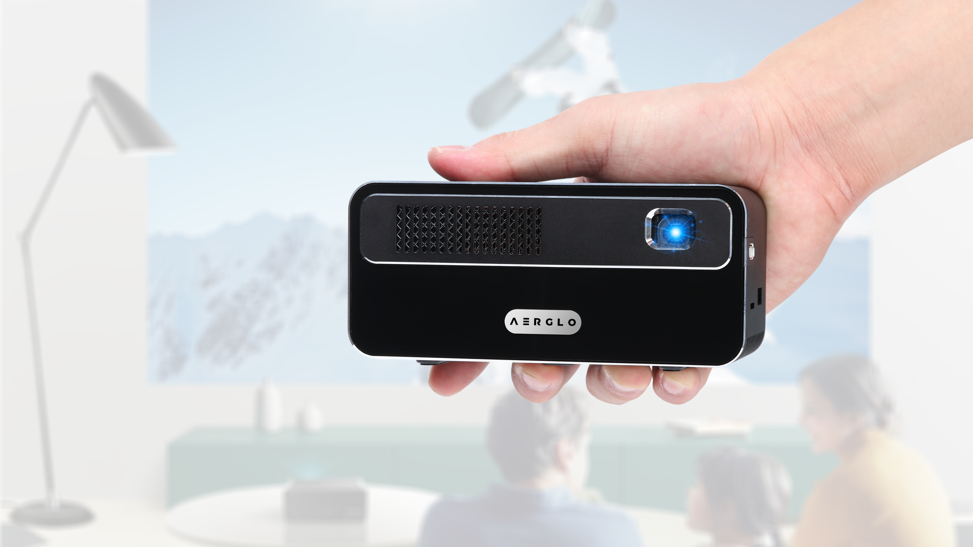 Aerglo Muzro Mini Smart Projector - hold on hand