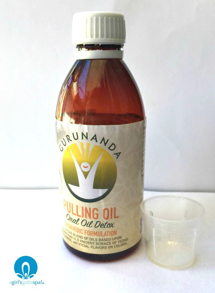 Oil pulling with Gurunanda Pulling Oil via @agirlsgottaspa