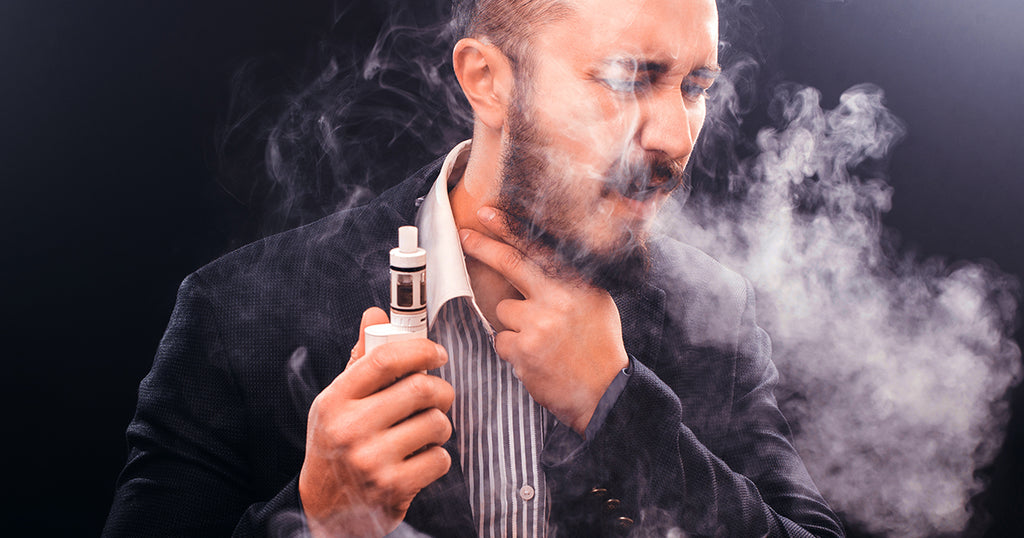 Man coughing from vaping