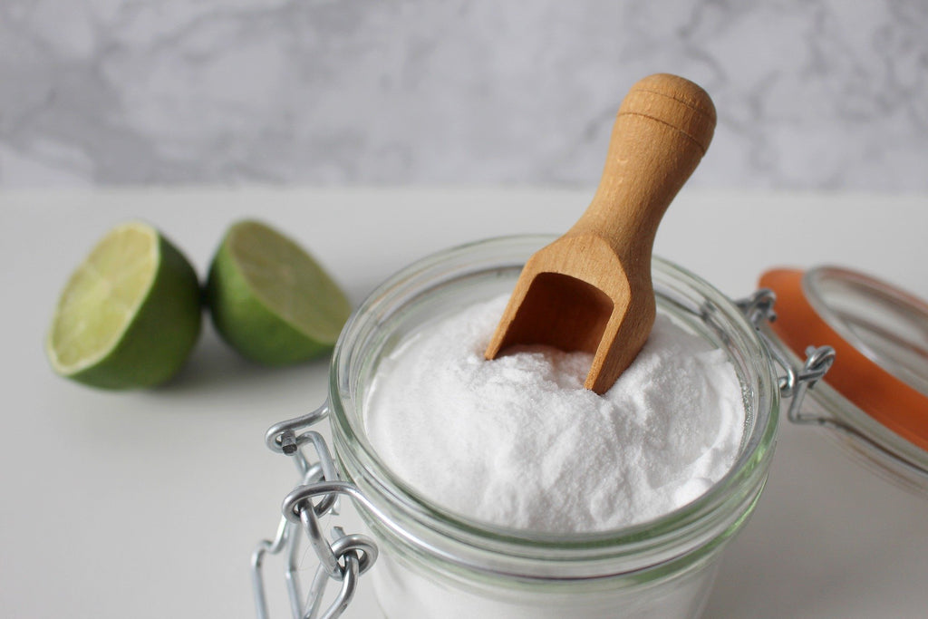 mason jar filled with salt and a wooden spoon