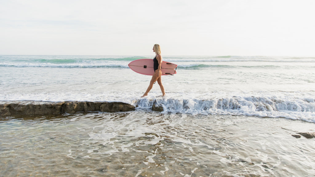 Georgina Monti - Preparing to surf in a Vivida Lifestyle surf one-piece