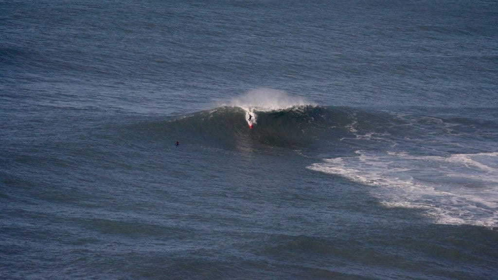 Nathan Carter Surfing a wave in Bude, Cornwall