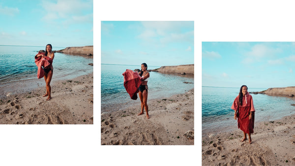 Woman putting on a poncho changing towel on the beach - Vivida Lifestyle