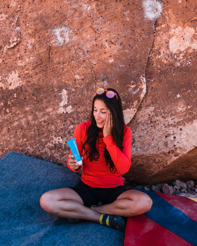 Skye Stoury applying the SPF30 Sunscreen Lotion in Red Rock Canyon, NV