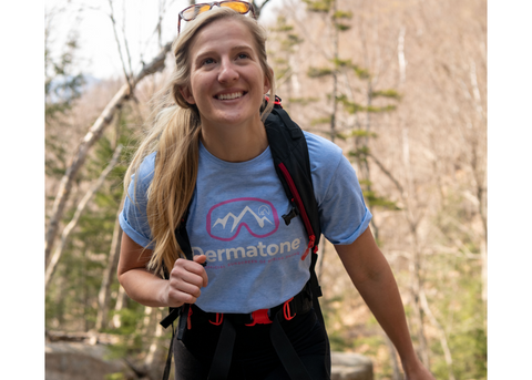 Spring skiing t-shirt on a woman hiking