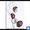 Leinwandbild Kokosnuesse Mit Wasserspritzer Hochformat Motivvorschau