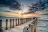 Leinwandbild Wellenbrecher Am Nordseestrand Hochformat Crop