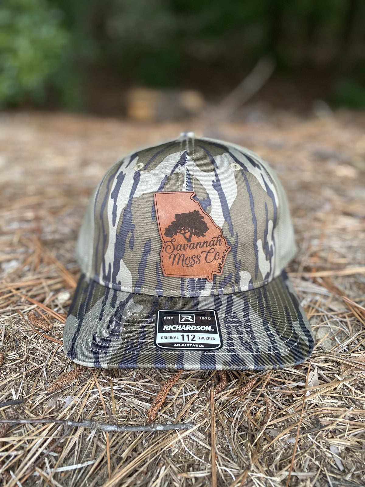 Savannah Moss Co. Bottomland Camo Leather Patch Hat