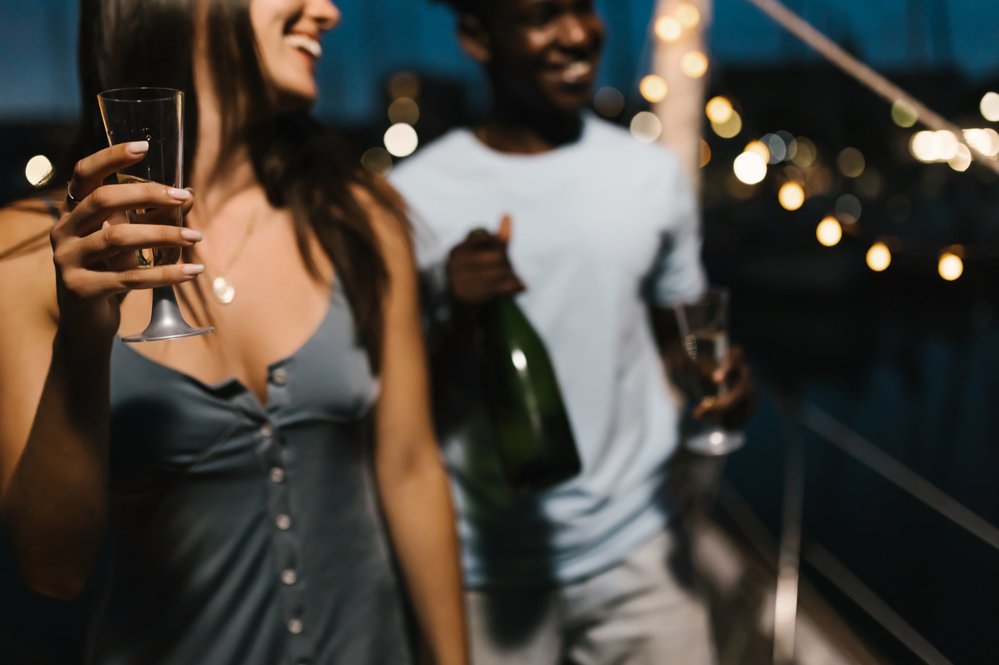 couple having a drink on boat