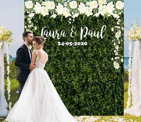 Grass wall wedding backdrop with flowers