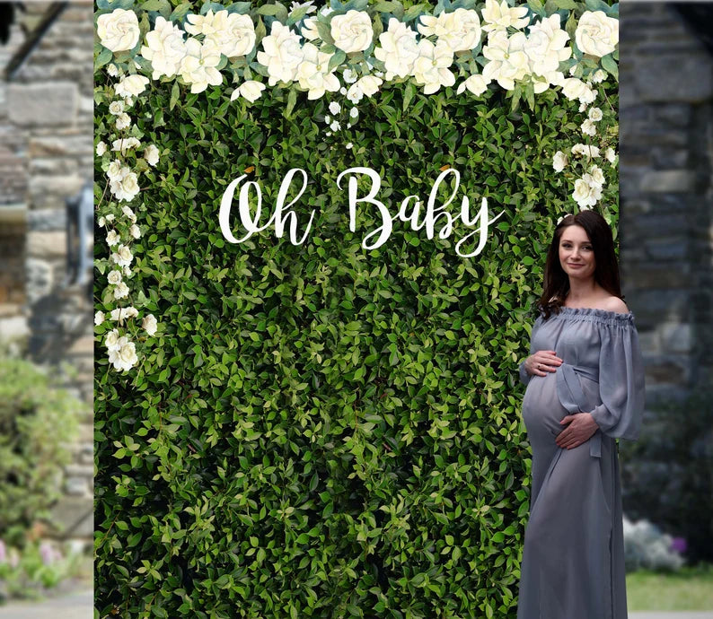 grass wall baby shower backdrop 