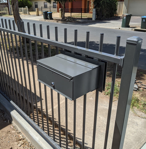 Woodland Grey Superior in Metal Tubular Fence Rear