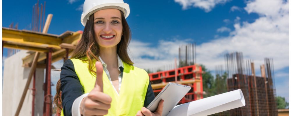 female construction work wearing safety vest