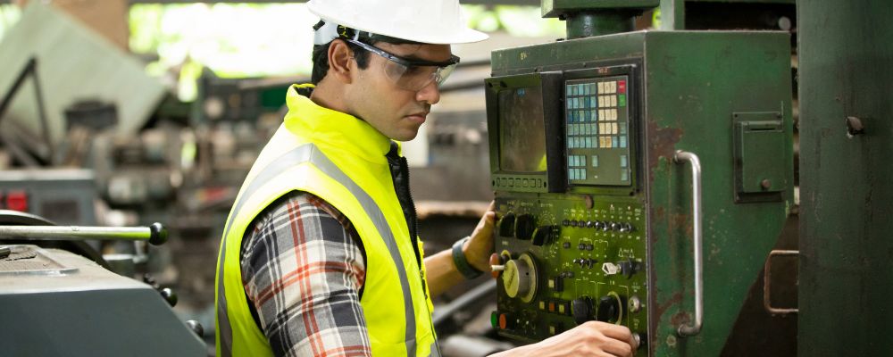 manufacturing workers with reflective safety vests