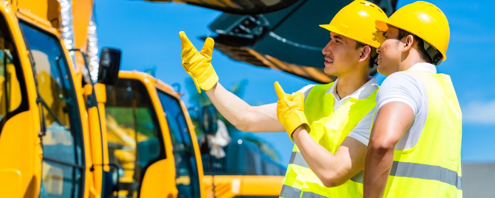 worker wearing safety vests in construction site